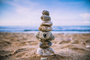 modern-3-piece-acrylic-print-stone-pile-on-the-beach