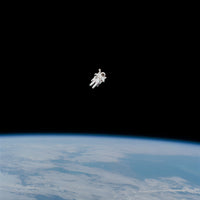 9-piece-canvas-print-lonely-astronaut-in-space