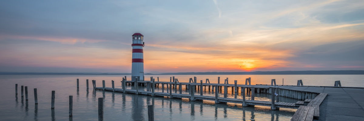 panoramic-3-piece-canvas-print-lighthouse-in-the-sunset-panorama